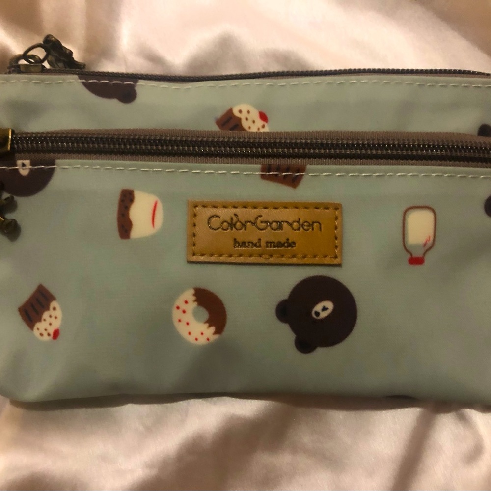 baby blue with images of bears, milk jugs, donuts, cupcakes !!!